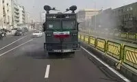 خودروی آب‌پاشِ یگان ویژه، کف خیابان‌های تهران 