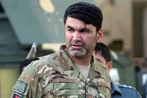 تصویر خبرساز از خاکسپاری پلیس افغان در تهران