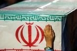 عکس دسته‌جمعی ۱۲ عضو یک خانواده که شهید شدند