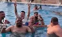 ورود یک ببر به استخر باعث وحشت شناگران شد