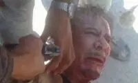 عکسی از لحظه آخر شلیک به معمر قذافی