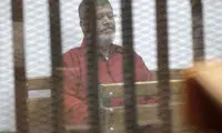 عکس: محمد مرسی در لباس اعدام