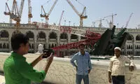 عکس یادگاری با جرثقیل سرنگون شده در مکه