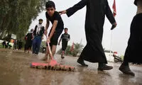 حال و هوای پیاده‌روی اربعین در جاده‌های بارانی