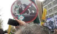 نفی سازش با تصویری از مصدق در ۱۳ آبان