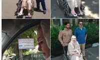 کتایون ریاحی با پای گچ‌گرفته روی ویلچر