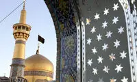 تعویض پرچم گنبد مطهر امام رضا (ع)