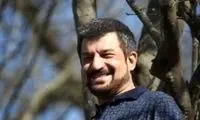 قاب بامزه محمود شهریاری در کنار نوه تازه‌متولدش