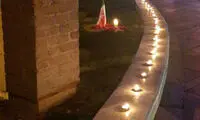 روشن کردن شمع به یاد قربانیان حوادث تهران