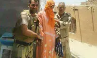 عکس: دستگیری یک داعشی با لباس زنانه