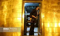 با آغاز ماه محرم، پرچم گنبد حرم رضوی تغییر کرد
