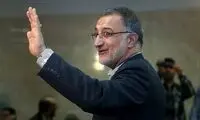 عکسی از زاکانی در بروکسل، کنار یک زن بی‌حجاب