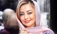 عکسی از نفیسه روشن روی صخره‌های ساحل خلیج فارس