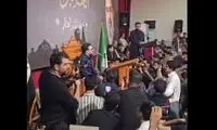 تصویر رهبر انقلاب در یک محفل قرآنی در عراق