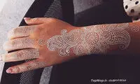 عکس: طراحی با حنای سفید بر روی بدن