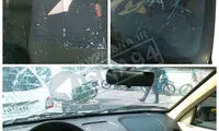 عکسی از خودروی نماینده بعد از حمله با میلگرد
