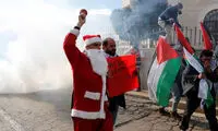 درگیری بابانوئل با نظامیان اسرائیل +عکس