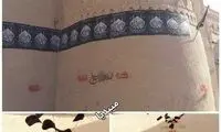 نوشتن شعار بر روی قلعه تاریخی مهرجرد میبد!