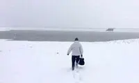 شنای مرد سلماسی در سرمای 18- درجه!