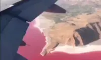 نمایی زیبا از دریاچه نادر قرمز رنگ در قلب ایران
