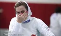 قابی از گریه‌های تلخ دختری که از قهرمانی باز ماند
