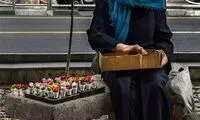 تلخ‌ترین عکسی که از یک مادر دست‌فروش ثبت شد