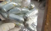 کشف یک کیلو کوکائین از شکم مسافر در فرودگاه امام!