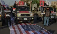 عراق: بازداشت عاملان توهین به پرچم آمریکا در رژه حشد الشعبی