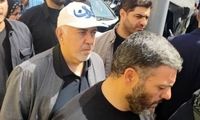 ظریف با کلاه ایران در مراسم بدرقه شهدای جنگ