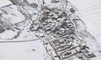 تصاویر هوایی از کوهرنگ در محاصره برف