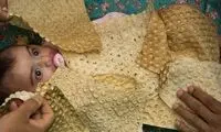 تصاویری از نذر نان‌پوشی که تاکنون ندیده‌اید
