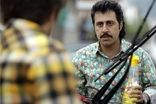 عکس پربازدید هومن حاجی‌عبداللهی در خاکسپاری امید جهان