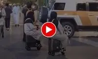 چمدان‌ سواری دو زن محجبه در خیابان‌های دبی!