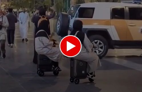 چمدان‌ سواری دو زن محجبه در خیابان‌های دبی!