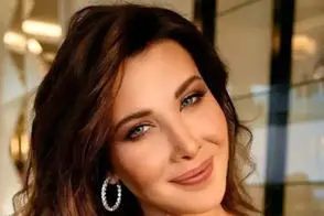 عکس زن و شوهری نانسی روی یک کشتی تفریحی
