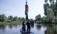 تصاویری از عزاداری سنتی کشمیری‌ها روی قایق