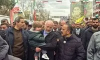 رفتار جالب‌توجه محافظان موسوی و اژه‌ای در مراسم 22 بهمن