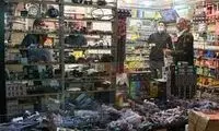 عکسی از نوشته یک مغازه‌دار عصبانی پشت شیشه