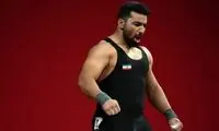 قهرمان وزنه‌برداری ایران، خود را تسلیم پلیس کرد