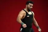قهرمان وزنه‌برداری ایران، خود را تسلیم پلیس کرد