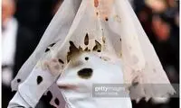 لباس عروس سوخته یک مدل در کن سوژه شد