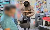 سرقت از فروشگاه مواد غذایی با تهدید اسلحه