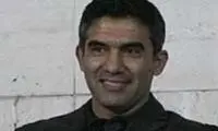فوق ستاره فوتبال ایران بر روی ویلچر