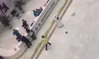 حمله عجیب یک زن چینی به یک ربات پرستار!
