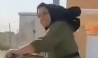 دوچرخه‌سواری خانم ایرانی در مسیر کربلا