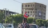 حضور عجیب یک موتورسوار با پرچم نازی در کرج!