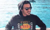 تصویری عاشقانه از رضا گوچی در کنار همسرش