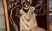خلاقیت یک کافه در انقلاب با تصویری از رضا پیشرو
