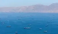 تصویر رویترز از کشتی‌های پهلو گرفته در تنگه هرمز