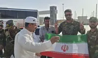 استقبال نیروهای مسلح از حجاج با پرچم ایران